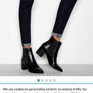 New black ankle boots